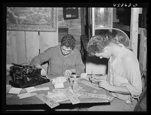 Painting signs for the exhibits at the World's Fair, Tunbridge, Vermont