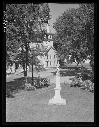 Untitled photo, possibly related to: Tunbridge, Vermont. Monument and a church