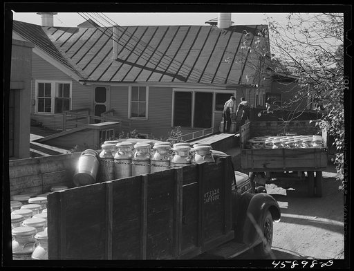 Untitled photo, possibly related to: Truck load of milk cans at the United Farmers' Co-op Creamery, East Berkshire, Vermont