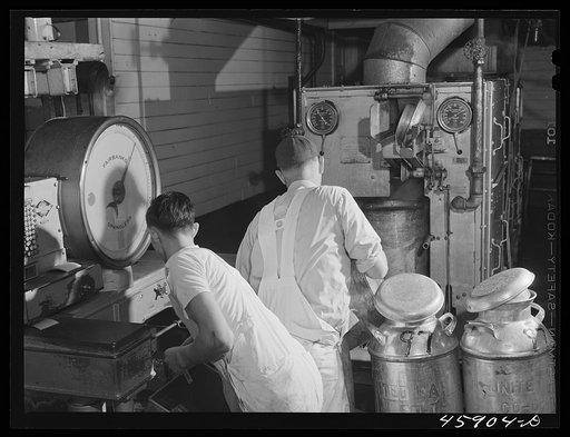 Untitled photo, possibly related to: Weighing the milk at the United Farmers' Co-op Creamery in East Berkshire, Vermont