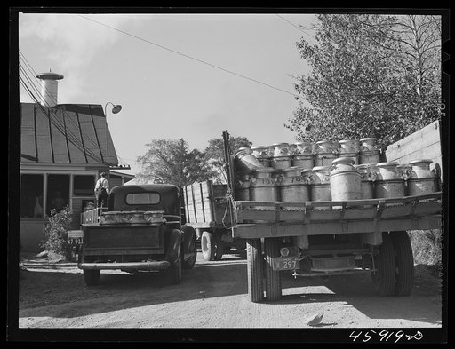 Truck load of milk cans at the United Farmers' Co-op Creamery, East Berkshire, Vermont