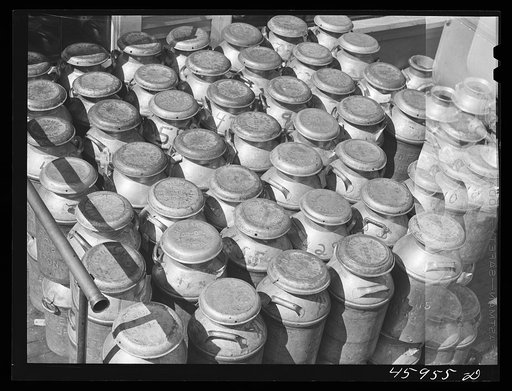 Milk cans at the United Farmers' Co-op Creamery in East Berkshire, Vermont