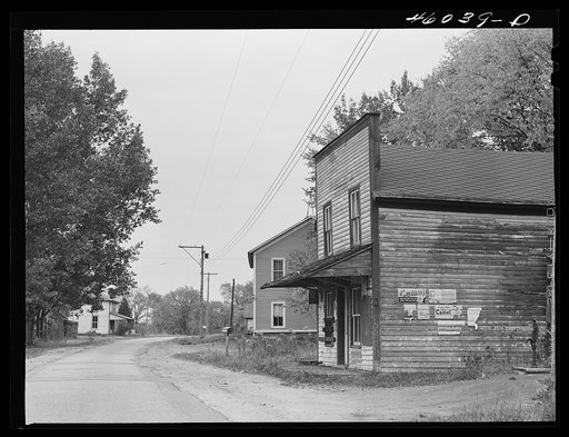 The main street of the village of Lewisburg, New York. The town is in the Pine Camp expansion area and is now completely deserted