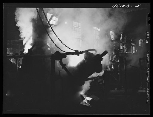 One of the machines that grinds wood into pulp at the Mississquoi Corporation paper mill. Seldon Springs, Vermont