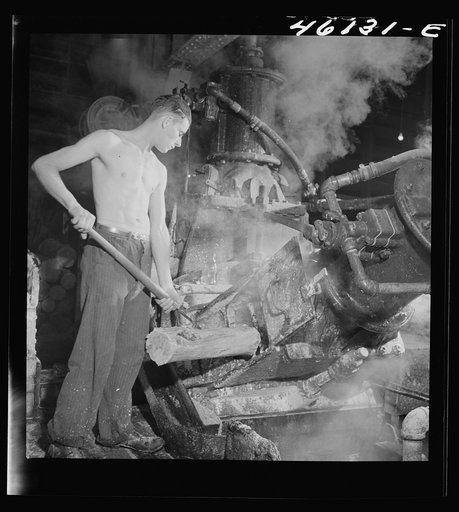 One of the machines that grinds wood into pulp at the Mississquoi Corporation paper mill, Sheldon, Springs, Vermont
