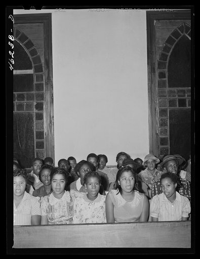Woodville, Greene County, Georgia. The community sing in the Negro church