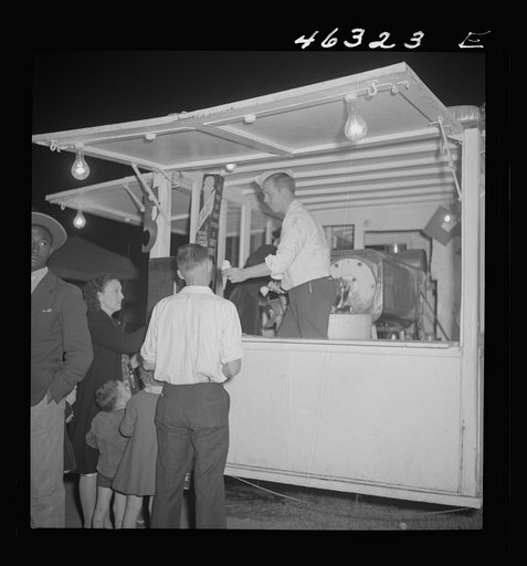 Untitled photo, possibly related to: Greensboro, Georgia. The Greene County fair in the evening