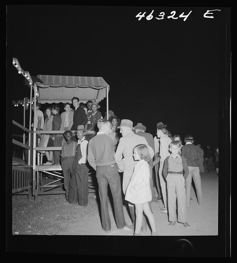 Untitled photo, possibly related to: Greensboro, Georgia. The Greene County fair in the evening