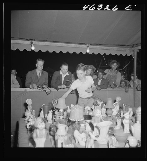 Untitled photo, possibly related to: Greensboro, Georgia. The Greene County fair in the evening