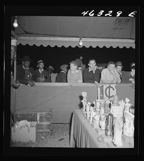 Untitled photo, possibly related to: Greensboro, Georgia. The Greene County fair in the evening