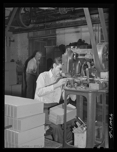 Making the boxes to pack socks in the Union Point textile mill, Greene County, Georgia