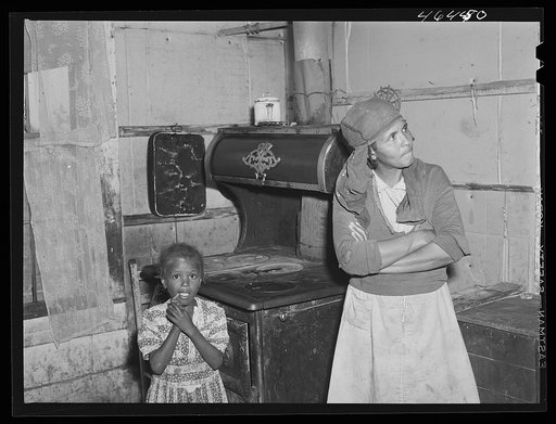 Untitled photo, possibly related to: Mrs. Buck Grant FSA (Farm Security Administration) client, with her canned goods. Near Woodville, Greene County, Georgia