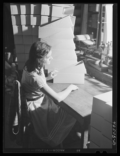 Untitled photo, possibly related to: Making boxes to pack socks in the textile mill in Union Point, Greene County, Georgia