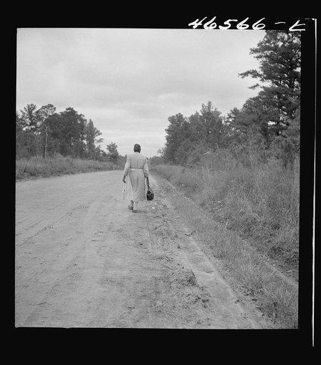 Untitled photo, possibly related to: Midwife going on a call, carrying her kit, near Siloam, Greene County, Georgia