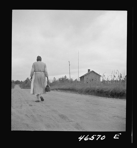 Untitled photo, possibly related to: Midwife going on a call, carrying her kit, near Siloam, Greene County, Georgia