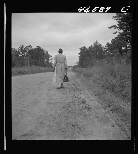 Untitled photo, possibly related to: Midwife going on a call, carrying her kit, near Siloam, Greene County, Georgia