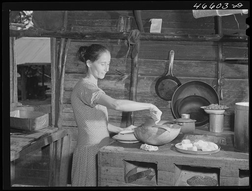 Manati (vicinity), Puerto Rico. Wife of a FSA (Farm Security Administration) borrower preparing lunch in their home