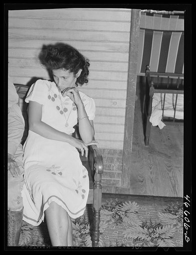 Untitled photo, possibly related to: Manati, Puerto Rico (vicinity). Wife of a foreman of a sugar plantation in her home