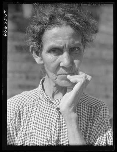 Widow of a farm laborer living on land which FSA (Farm Security Administration) is buying for a tenant purchase project. Vicinity of Manati, Puerto Rico