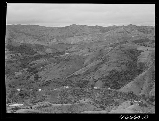 Corozal, Puerto Rico (vicinity). Hills in the country. Houses in foreground are reinforced concrete structures built by the PRRA (Puerto Rico Rehabilitation Administration) program