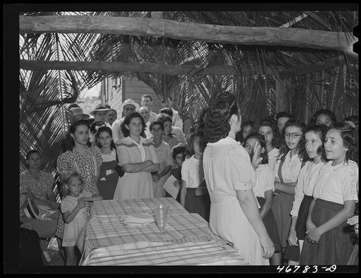 Corozal, Puerto Rico (vicinity). Glee club singing "God Bless America" (in Spanish) at the tenant purchase celebration