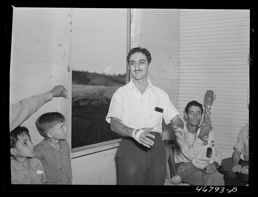 Corozal, Puerto Rico (vicinity). Principal of a nearby school reciting a poem at the tenant purchase celebration