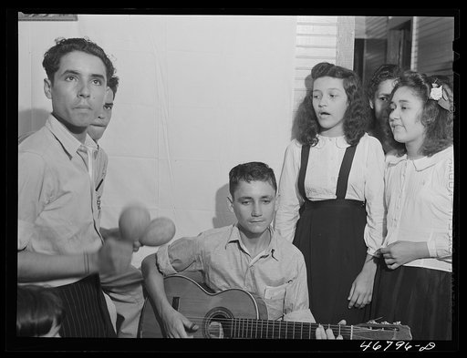 Untitled photo, possibly related to: Corozal, Puerto Rico (vicinity). At a party for FSA (Farm Security Administration) tenant purchase borrowers on a farm