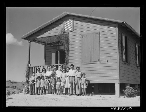 The family of Ecequiel Irene, FSA (Farm Security Administration) tenant purchase borrower, in front of their new tenant purchase house. Corozal (vicinity), Puerto Rico