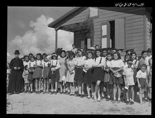Corozal, Puerto Rico (vicinity). The priest, the glee club and others who attended the tenant purchase celebration on a farm
