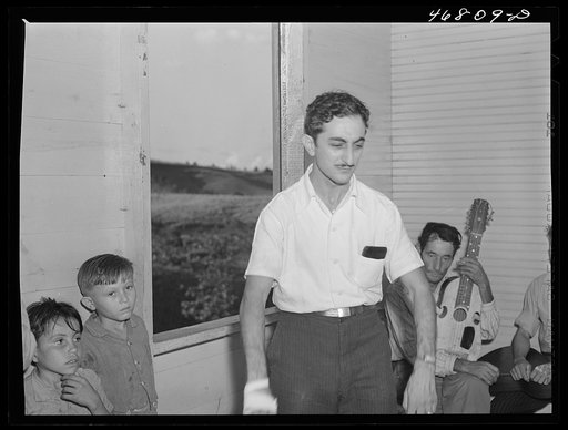 Untitled photo, possibly related to: Corozal, Puerto Rico (vicinity). Principal of a nearby school reciting a poem at the tenant purchase celebration