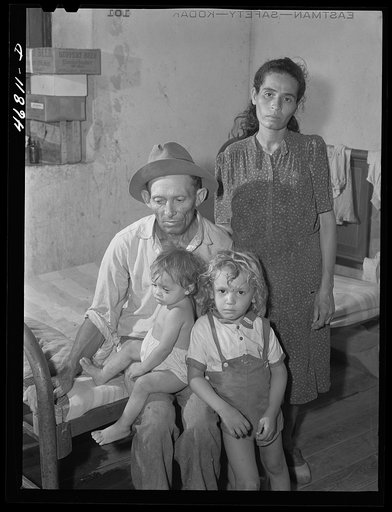 Frederiksted, Saint Croix, Virgin Islands (vicinity). Puerto Rican family living in one of the villages reconditioned by the Virgin Islands Company. The Puerto Rican population in the islands has increased in the last decade