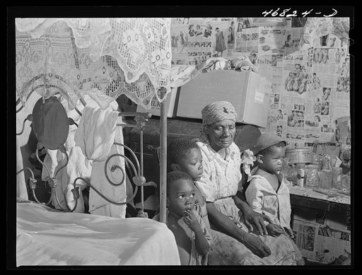 Christiansted, Saint Croix Island, Virgin Islands (vicinity). Family living in one of the slum "villages" which were formerly slave quarters
