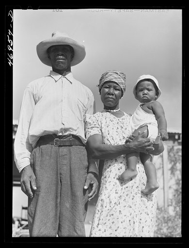 Frederiksted (vicinity), Saint Croix Island, Virgin Islands. FSA (Farm Security Administration) borrower and his family who live in one of the homestead houses