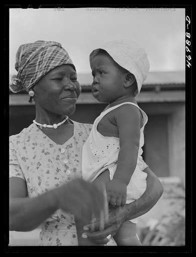 Untitled photo, possibly related to: Wife and child of a FSA (Farm Security Administration) borrower living in a homestead house near Fredericksted, St. Croix, Virgin Islands