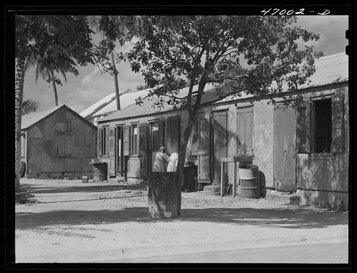 Untitled photo, possibly related to: Frederiksted, Saint Croix Island, Virgin Islands. A long row house