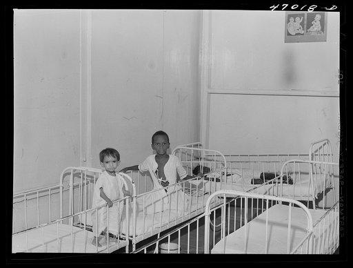 Untitled photo, possibly related to: Frederiksted, Saint Croix, Virgin Islands. Child on the left, in the children's ward of the Frederiksted hospital, is suffering from severe malnutrition