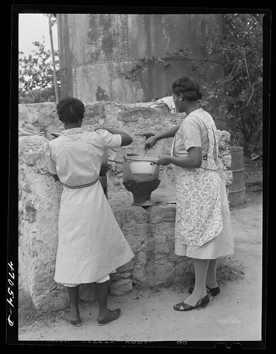 Christiansted, Saint Croix Island, Virgin Islands (vicinity). Cooking hot lunches for children at Peter's Rest elementary school