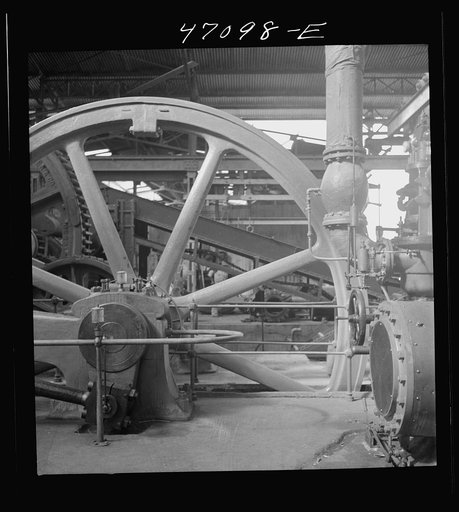 Untitled photo, possibly related to: Saint Croix Island, Virgin Islands. Reconditioning machinery in the Bethlehem sugar mill