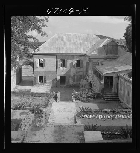 Untitled photo, possibly related to: Christiansted, Saint Croix, Virgin Islands. Changing classes at the Christiansted high school