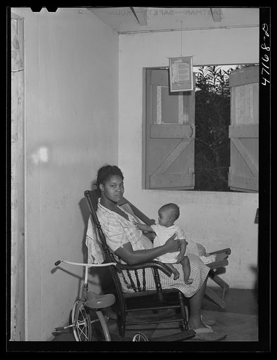 Untitled photo, possibly related to: Charlotte Amalie, Saint Thomas Island, Virgin Islands. Wife of a defense worker living in the federal housing project