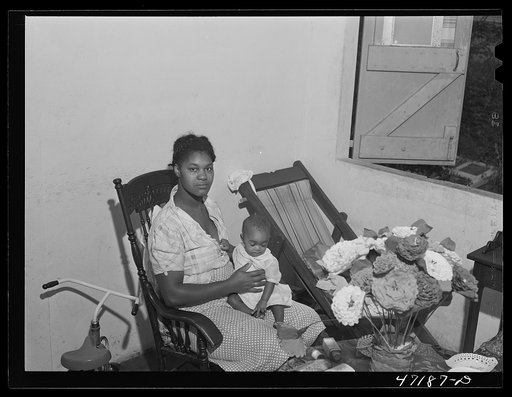 Charlotte Amalie, Saint Thomas Island, Virgin Islands. Wife of a defense worker living in the federal housing project