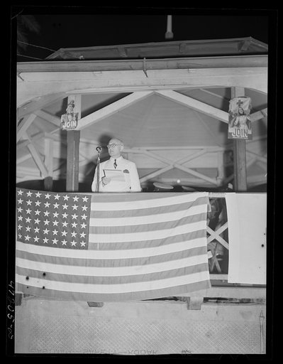 Untitled photo, possibly related to: Charlotte Amalie, Saint Thomas Island, Virgin Islands. Governor Harwood making his speech at the Red Cross meeting held in the square