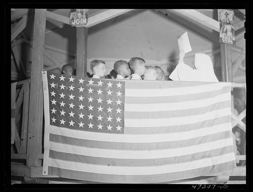 Untitled photo, possibly related to: Charlotte Amalie, Saint Thomas Island, Virgin Islands. Boys' choir from the Catholic church singing at the Red Cross meeting in the square