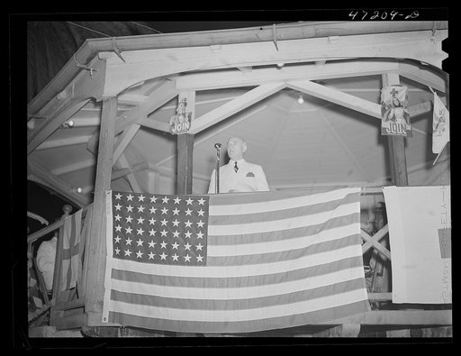 Charlotte Amalie, Saint Thomas Island, Virgin Islands. Governor Harwood making his speech at the Red Cross meeting held in the square