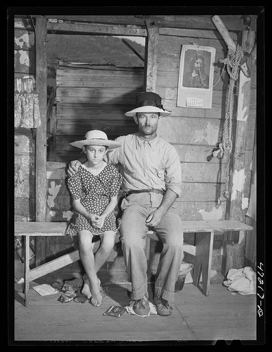 French village, a small settlement on Saint Thomas Island, Virgin Islands. Father and one of his children who live at the French village, a small settlement