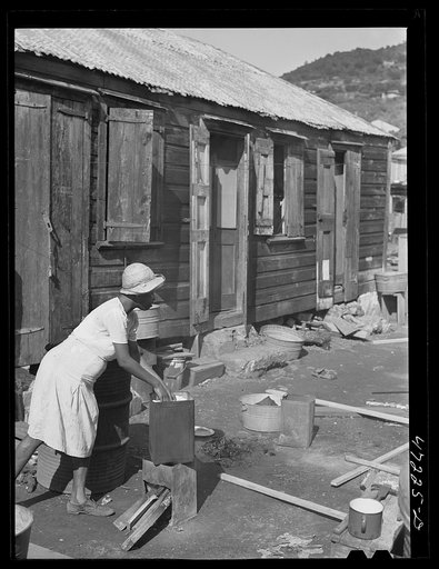 Untitled photo, possibly related to: Charlotte Amalie, Saint Thomas Island, Virgin Islands. Washing clothes in a slum section