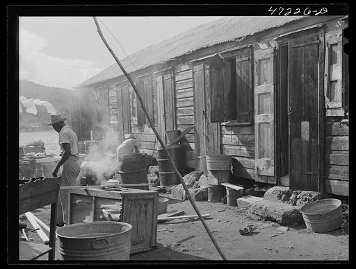 Charlotte Amalie, Saint Thomas Island, Virgin Islands. Washing clothes in a slum section