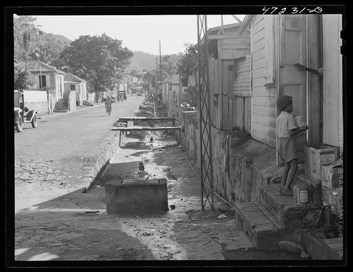 Charlotte Amalie, Saint Thomas Island, Virgin Islands. Open sewers along the street