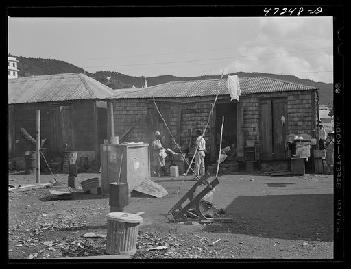 Untitled photo, possibly related to: Charlotte Amalie, Saint Thomas Island, Virgin Islands. Washing clothes in a slum section
