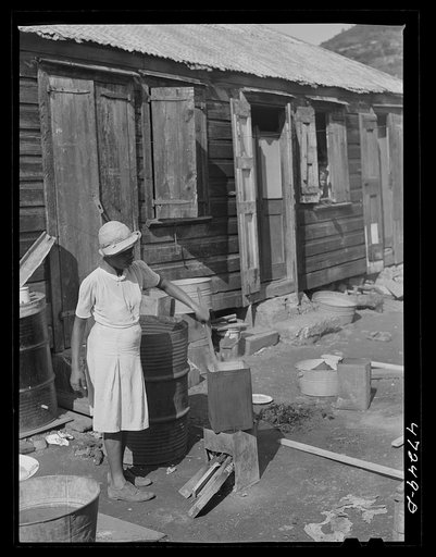 Charlotte Amalie, Saint Thomas Island, Virgin Islands. Washing clothes in a slum section
